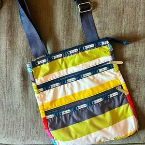 LeSportSac Striped Crossbody bag with multiple zippers, nylon strap